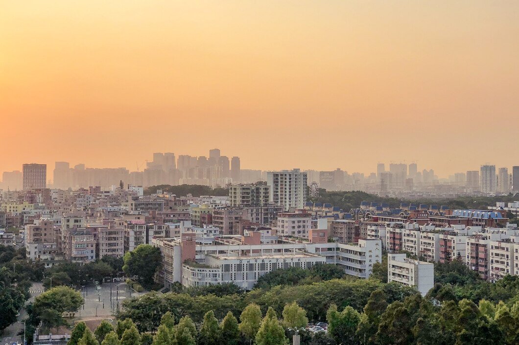 panoramic-aerial-shot-cityscape-colorful-skyline-sunset-aerial_181624-28641
